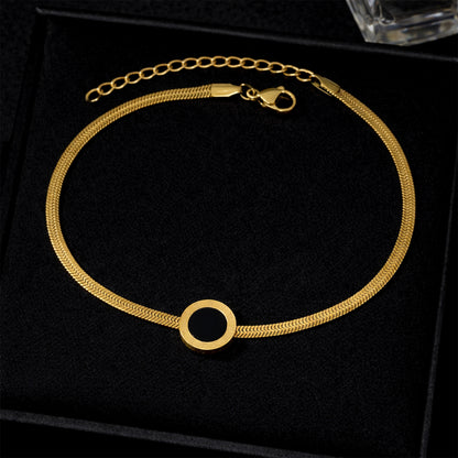 Pulsera Dorada con Dije Circular Negro en Acero Inoxidable